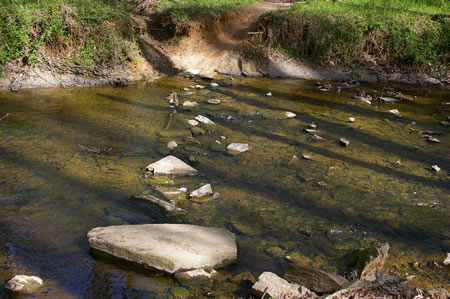 This is a difficult creek crossing and marks the end of this section.