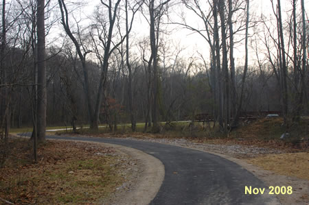 The trail curves to the left at the start of the new section. The old trail continued to the left.