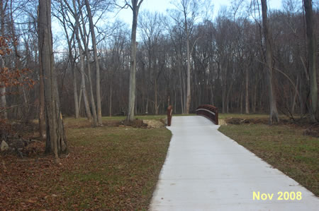 The trail turns to the right to cross Accotink Creek on a bridge.