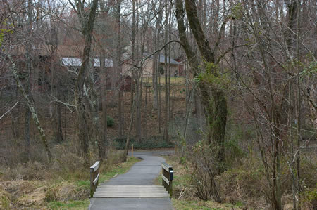 The trail turns left and crosses a bridge over the Glade Stream.