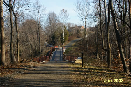 The trail crosses a bridge over Giles Run. Take the trail to the left after crossing the bridge.