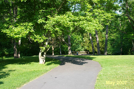 Follow the asphalt trail down the hill.