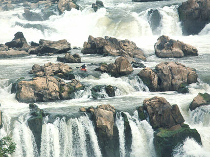 This kayaker enjoys danger.