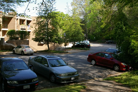 The trail ends at a parking area.  Cut across the street diagonally to the right.