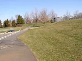 The trail passes through athletic fields.