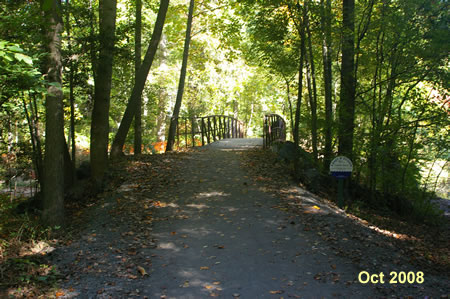 The trail crosses a bridge over Snakeden Creek.