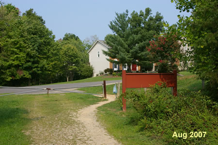 The service road intersects with Wagon Trail Lane.