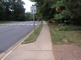 Turn right at the intersection with Soapstone Dr. and follow the sidewalk along that road.