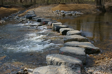 Large flat topped boulders have been placed at this crossing.