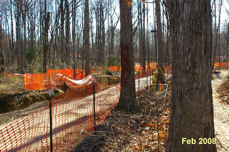 You can see the paved and temporary trails in both pictures looking east.